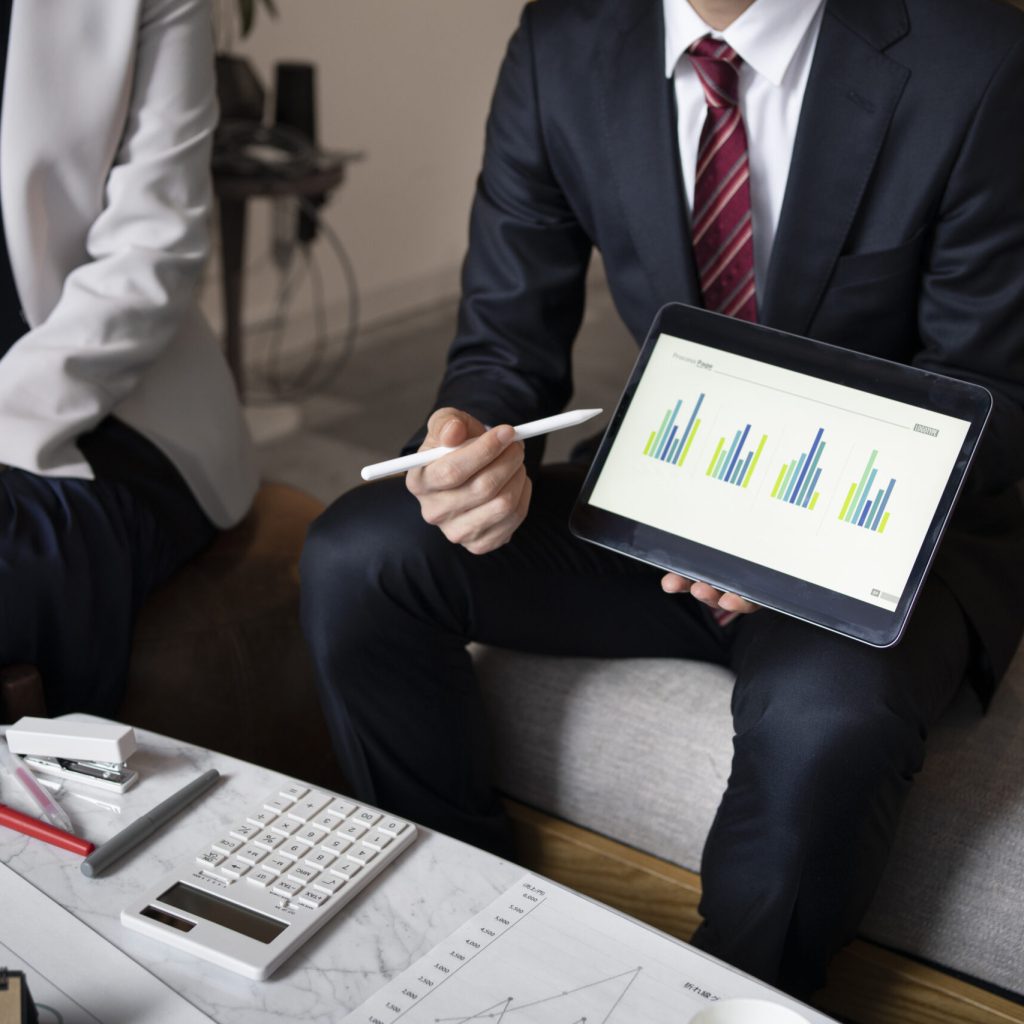 business-people-working-with-ipad-high-angle